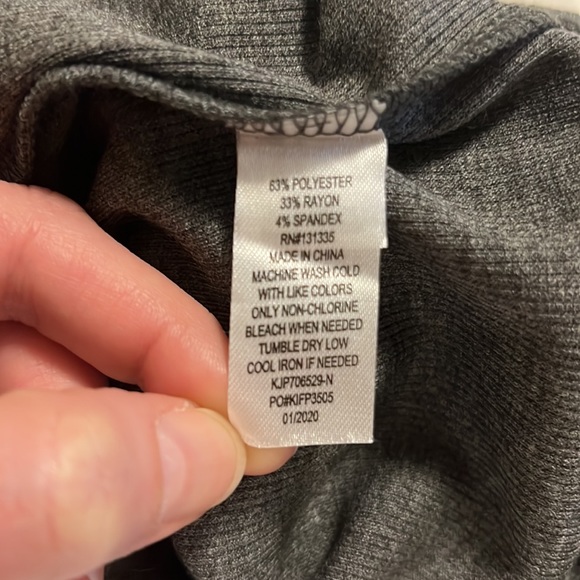 Gray, cropped/ankle jumpsuit with straight leg. Thin straps and button down top. - Picture 6 of 10